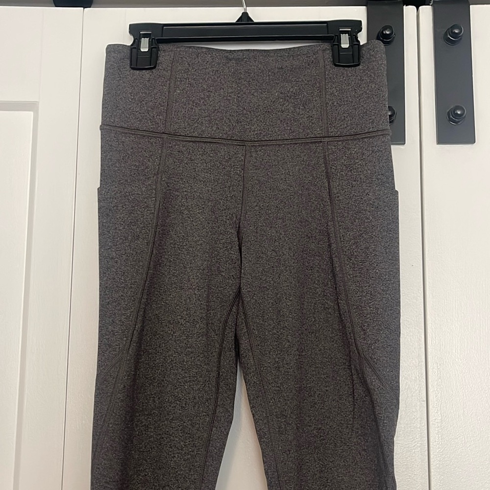 Athleta Stash Pocket Salutation Tight